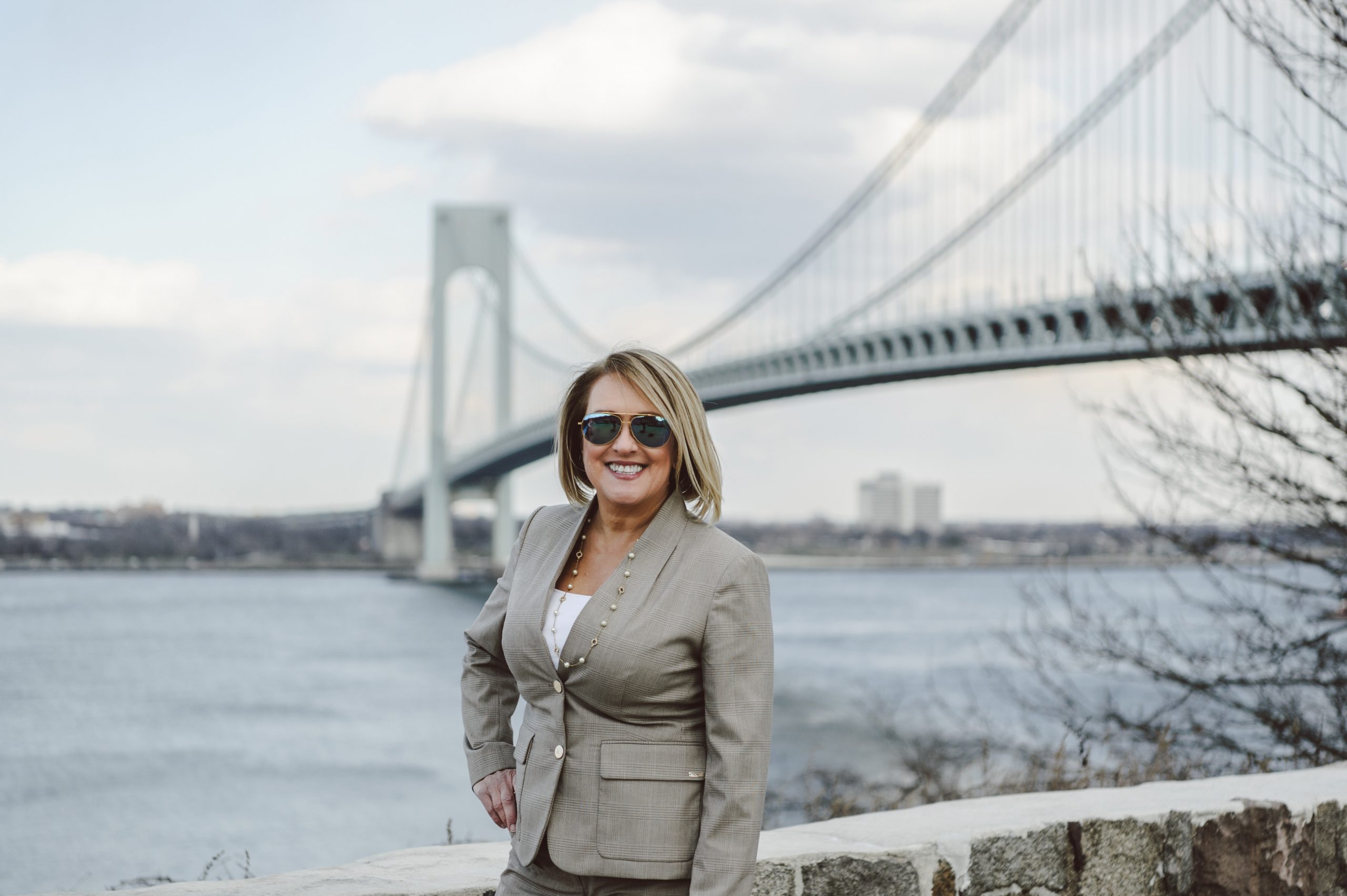 Holly Wiesner Olivieri in front of the Verrazano Bridge