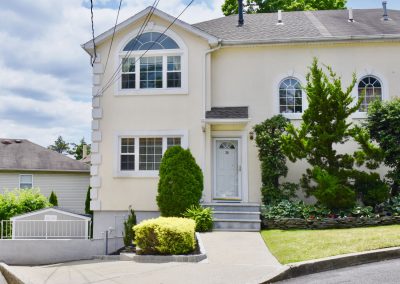 Spacious 3-bedroom, 4-bath broadside semi on a private cul-de-sac, located in the desirable Grymes Hill neighborhood of Staten Island's North Shore, boasting water and bridge views.