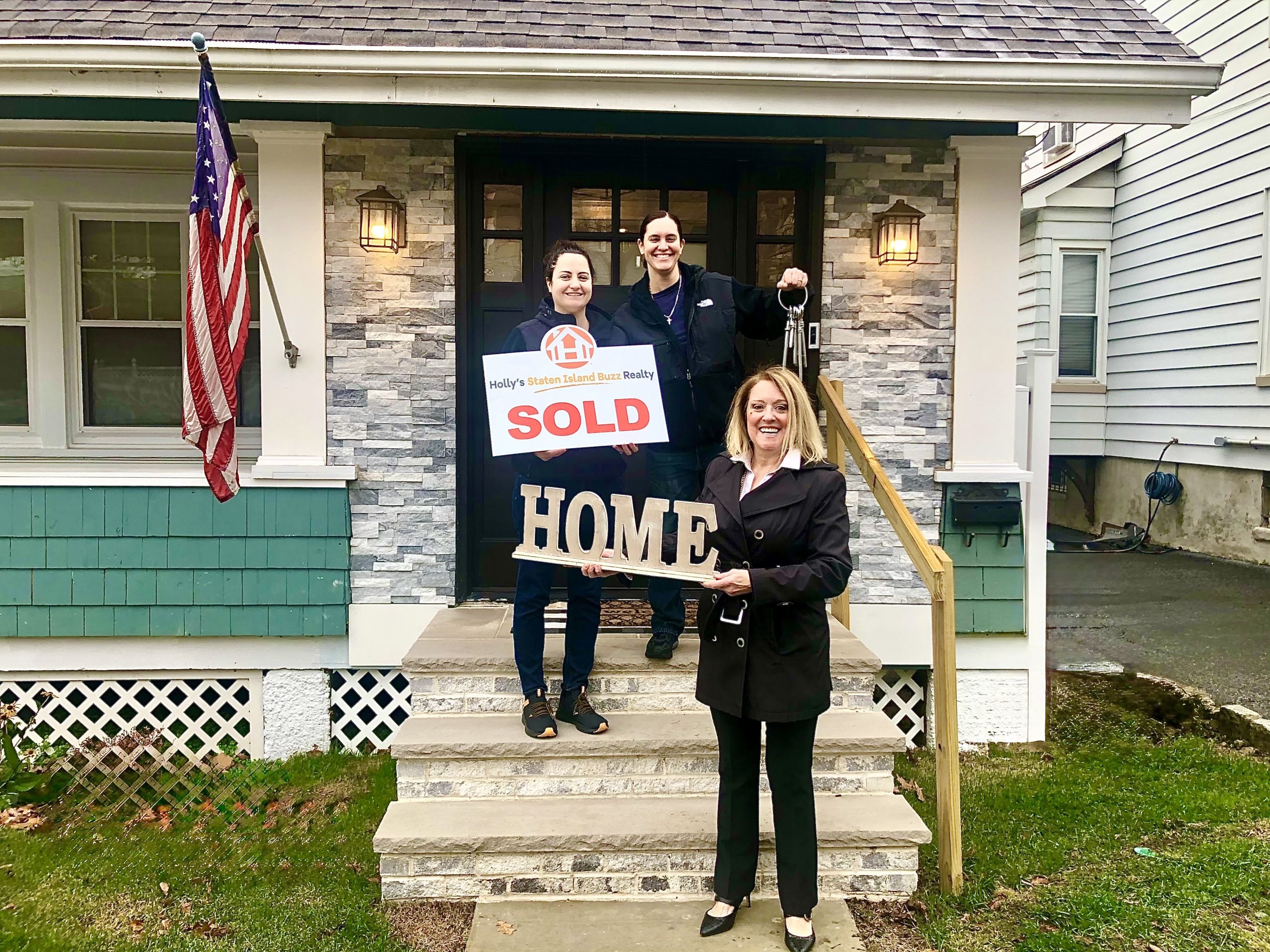 Happy buyers Jackie and Kathryn celebrating their first home purchase in Westerleigh, Staten Island with Holly’s Staten Island Buzz Realty.